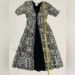 Black and white print dress with short sleeves oval neck line Fit and flare